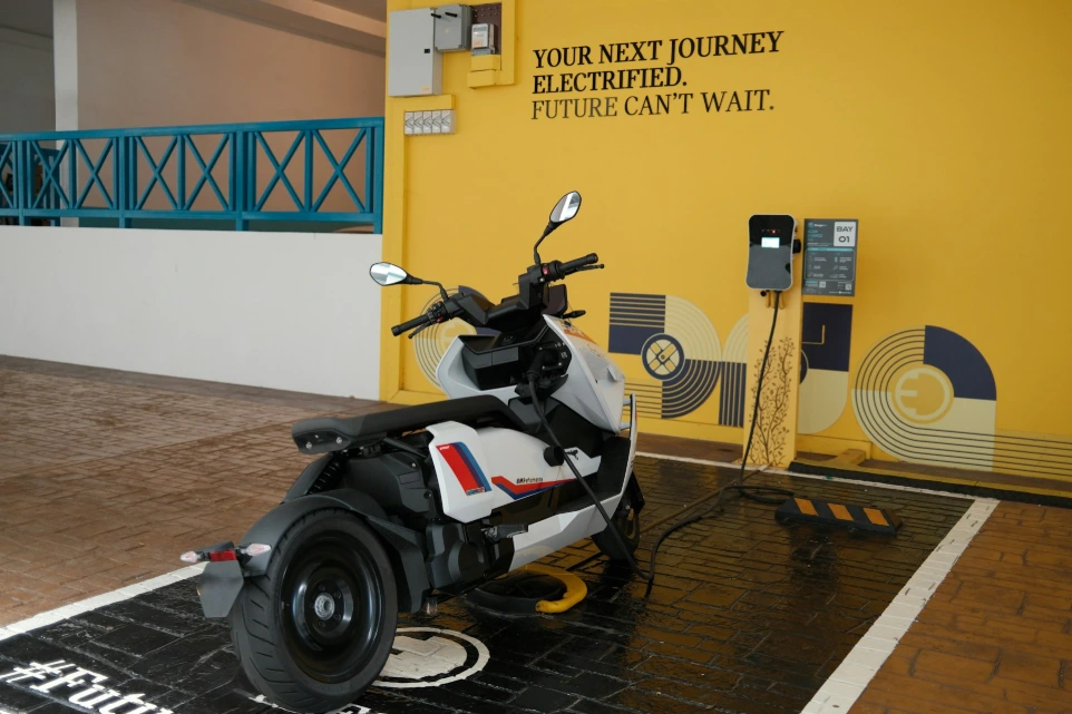 A motor scooter parked in a parking garage